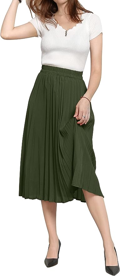 Tendencias otoño 2023: 7 blusas y tops que puedes usar con una falda midi tableada