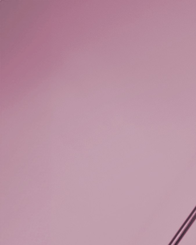 Karol G con la mercancía de Spotify x Barca.